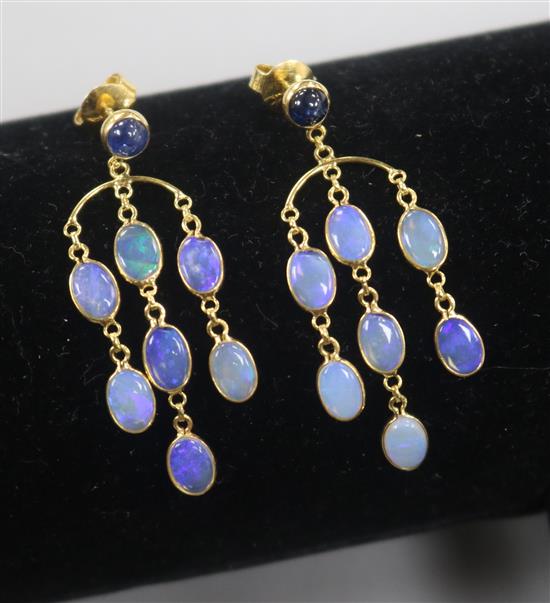 A modern pair of 14ct gold, white opal and cabochon sapphire set drop earrings, 39mm.